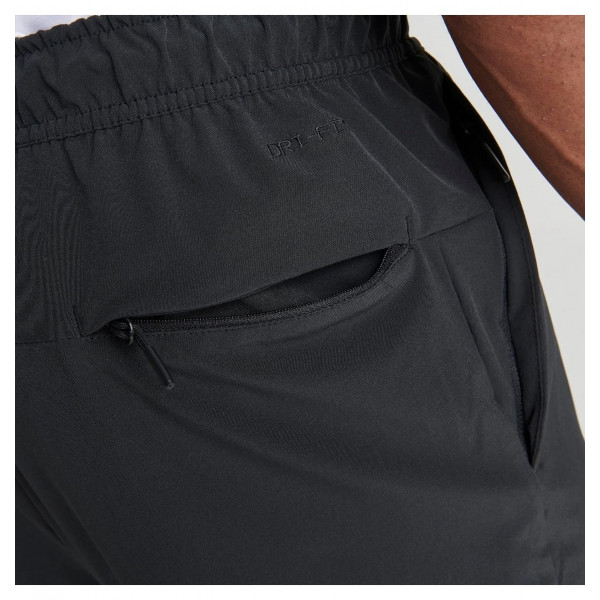 Брюки чоловічі Nike Dri-Fit Unlimited Tapered Leg (FB7548-010)