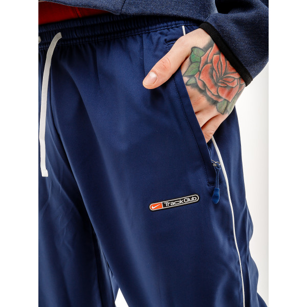 Штани чоловічі спортивні Nike TRACK CLUB PANT FB5503-410